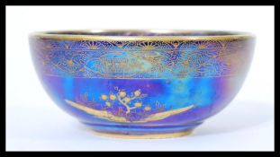 A Carlton Ware lustre ware bowl in the Persian pattern with makers stamps to base. Measures 5.5 cm