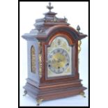 A vintage early 20th century German mantel clock having gilt ormolu acanthus leaf embellishments