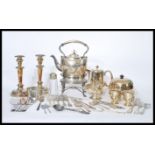 A collection of vintage silver plate to include a Walker and Hall picnic kettle spirit burner,