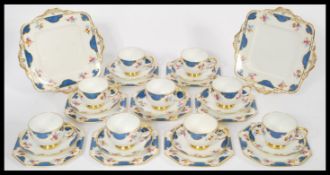 A vintage early 20th century 1920's Paragon fine bone china tea service consisting of six cup,