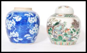 A 19th century Chinese famille Verte lidded ginger jar having bird and flower decoration with double