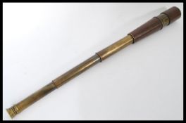 A four draw field telescope made by Broadhurst Clarkson and Co Ltd and retailed by H Salanson and Co