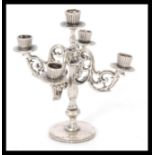 A continental silver miniature dolls house furniture five sconce candelabra having four branch