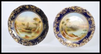 A pair of 19th Century Victorian hand-painted cabinet plates by Davenport, each plate with a