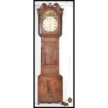 A 19th century Victorian North Country oak and mahogany thirty hour longcase clock. The hood