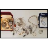 A group of sterling silver jewellery to include heart padlock bracelet, amber type necklace and