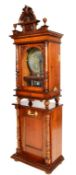 A late 19th Century Victorian full size upright penny slot Polyphon. Set in a fabulous walnut case