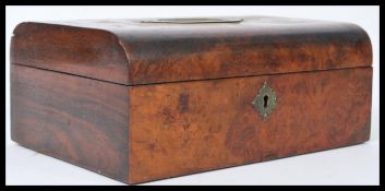 A 19th century Victorian Walnut jewellery box having a domed lid with recessed handle. The hinged