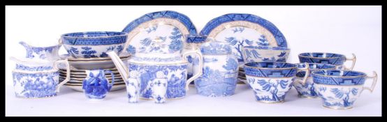 A collection of blue and white ceramics to include a part dinner service, teapot, lidded jar etc.
