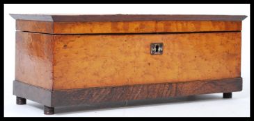 A 19th century Burr maple ladies workbox. The hinged lid marked Fillet and opens to reveal a fully