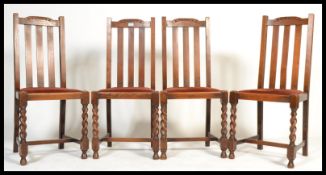 A set of four early 20th Century Art  Deco oak barley twist  dining chairs, high rail back, drop