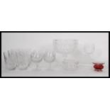 A collection of vintage 20th Century cut glass crystal to include brany glasses, tumblers, rose bowl