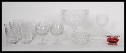 A collection of vintage 20th Century cut glass crystal to include brany glasses, tumblers, rose bowl