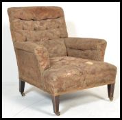 A 19th century  Victorian mahogany Chesterfield type armchair in the manner of Howards being