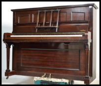 A vintage 20th century mahogany and iron cased upr