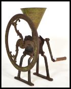 A 19th century Victorian cast iron larger Grocers shop display coffee grinder. Raised on twin stands