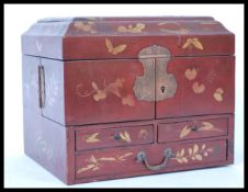 A 1930's Japanese chinoserie and lacquered ladies jewellery box. The red body with gilded decoration