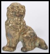 A 19th Century Victorian brass door stop, figure modelled in the form of a Kings Charles Spaniel