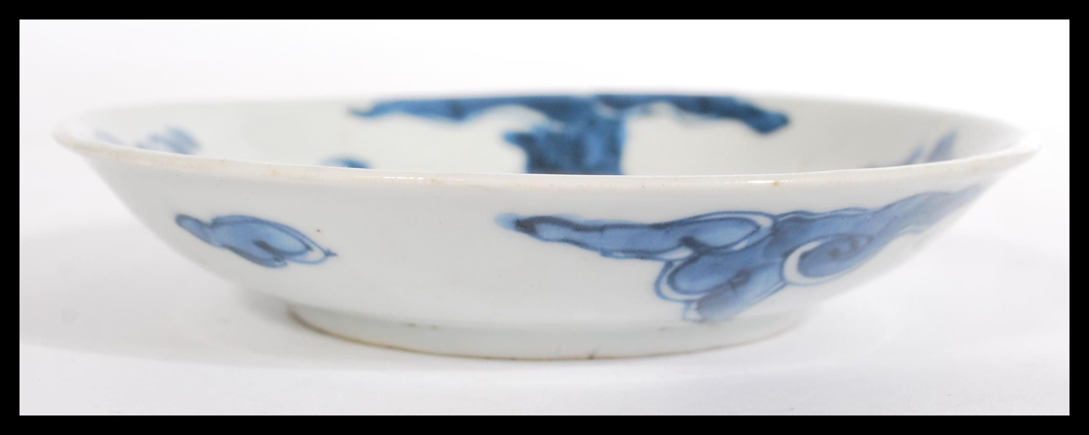 A 19th century Chinese blue and white plate having - Image 4 of 5