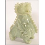 An unusual large Chinese Jade fu dog - temple dog