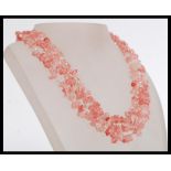 A fine three strand rose quartz graduated necklace