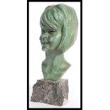 A 20th century continental bust of a young girl by