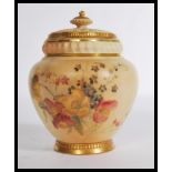 A Royal Worcester quarter lobed gilded ivory blush