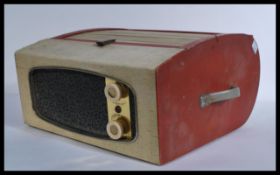 A mid century Monarch two tone portable record pla