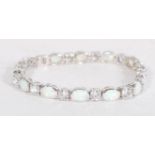 A sterling silver and opal panel tennis bracelet h