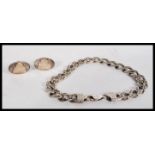A 925 silver and CZ curb chain link bracelet toget