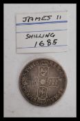 A 17th century James II 1685 Shilling silver coin.