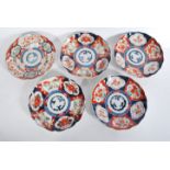A group of early 20th century Japanese Imari charg