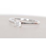 An 18ct white gold single stone diamond solitaire