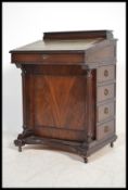 A Victorian style mahogany davenport writing desk.