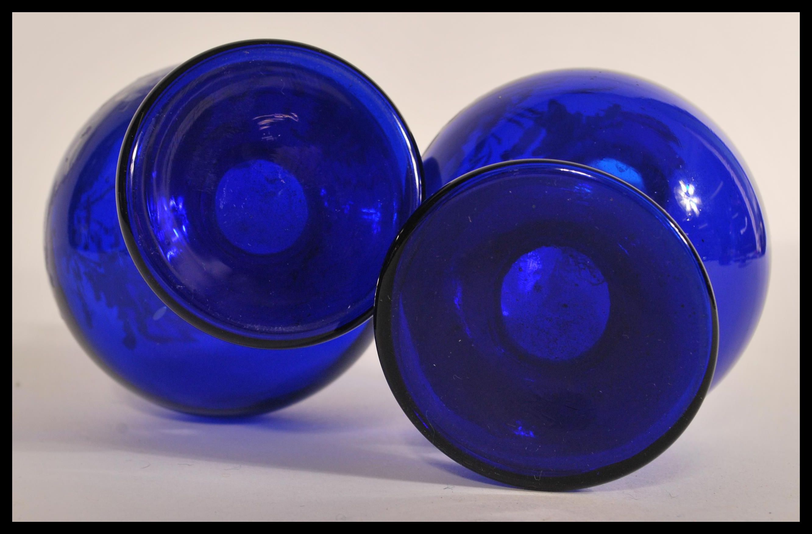 A 19th century Victorian pair of blue glass vases - Image 6 of 6