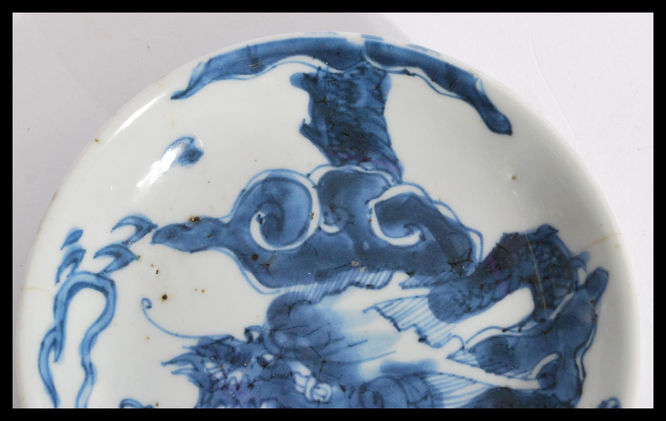 A 19th century Chinese blue and white plate having - Image 2 of 5