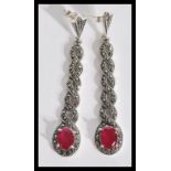 A pair of sterling silver and marcasite drop earri