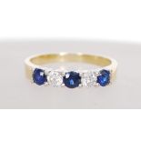 An 18ct gold diamond and sapphire ring having appr