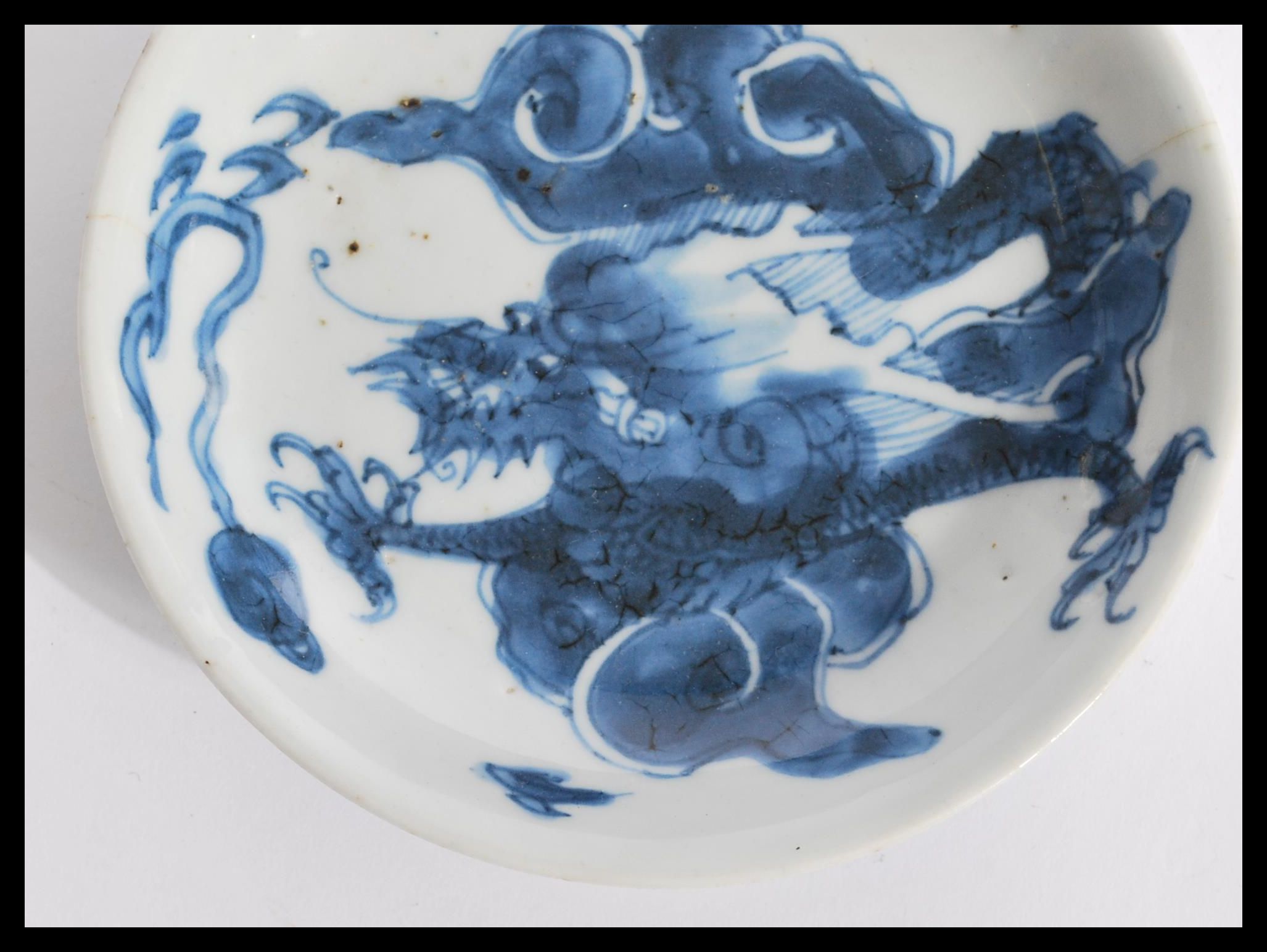 A 19th century Chinese blue and white plate having - Image 3 of 5