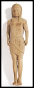 An early 20th century carved wooden figurine of an