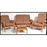 A vintage retro 20th century Ercol three piece sui