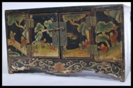 An early 20th century Chinese lacquered wooden box