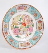 A 20th century Chinese footed dish having hand pai