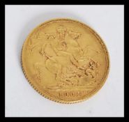 An Edward VII 1904 full sovereign coin, St George