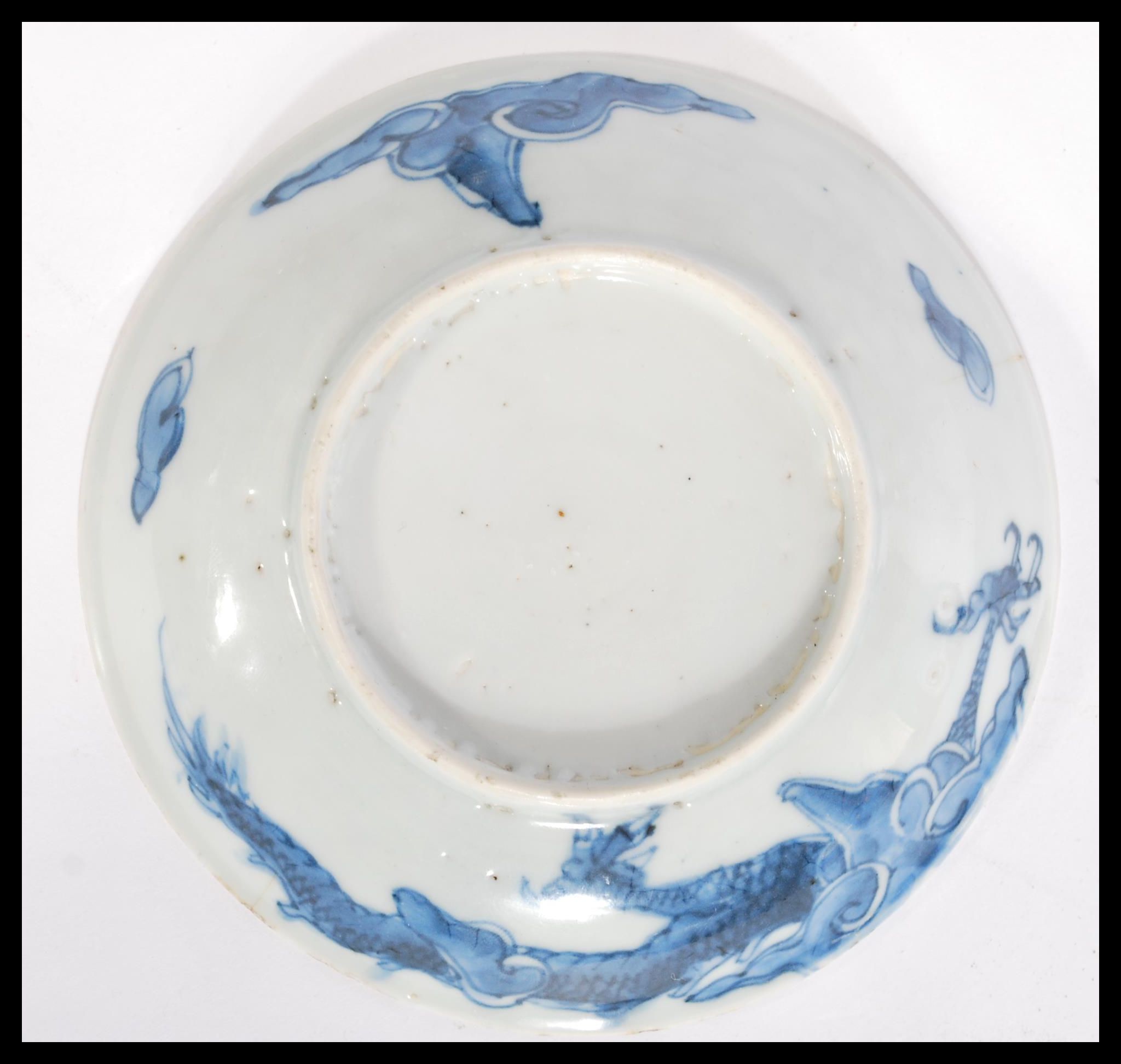 A 19th century Chinese blue and white plate having - Image 5 of 5