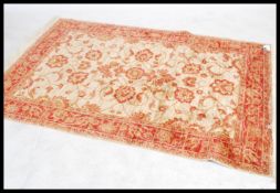 A large Persian Ziegler carpet - rug having beige