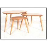 A vintage / retro set of Ercol light  beech and el