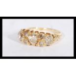 An 18ct gold seven stone diamond ring of approx 1.