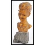 A 20th century continental bust of a young girl by