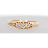 An 18ct gold three stone diamond ring having appro